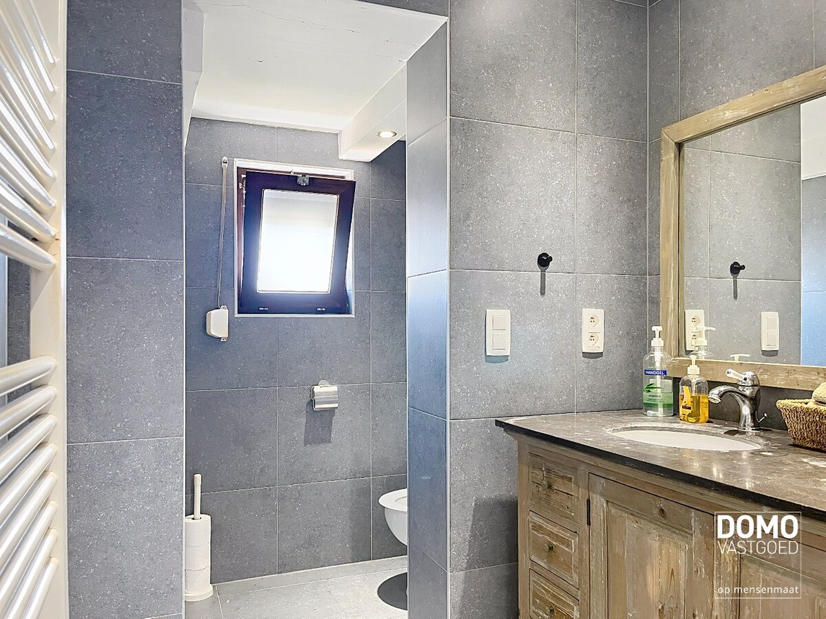 Gerenoveerde open bebouwing met tuin gelegen te Hasselt 