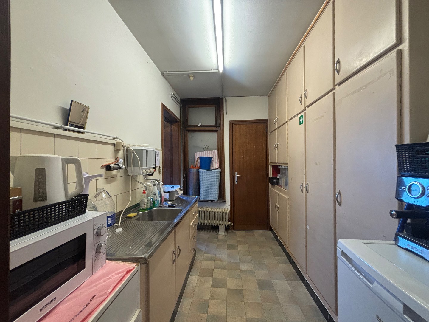 Handelshuis met 2 garages op topligging in centrum van Mol 