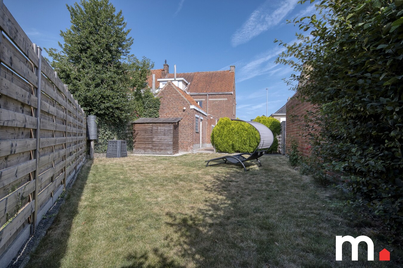 Kloeke half open bebouwing in Desselgem met tuin, terras en garage . 