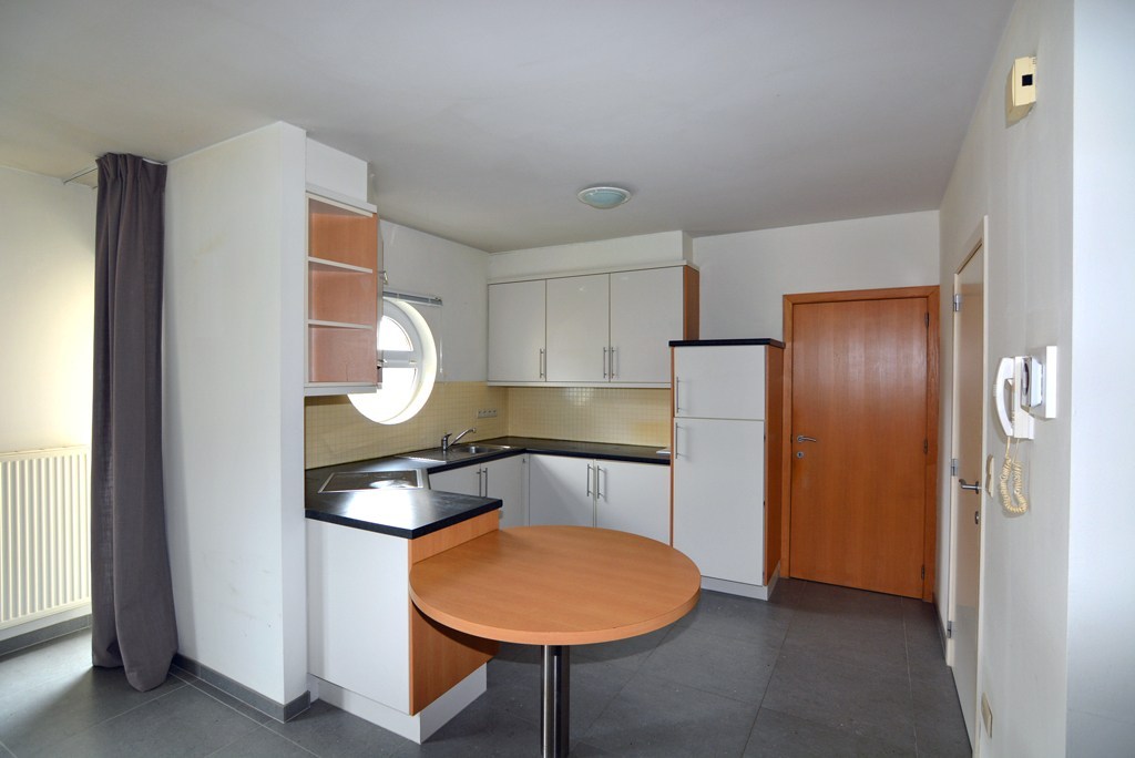 Appartement (104 m²) met 2 slpks, garage en kelderberging. 