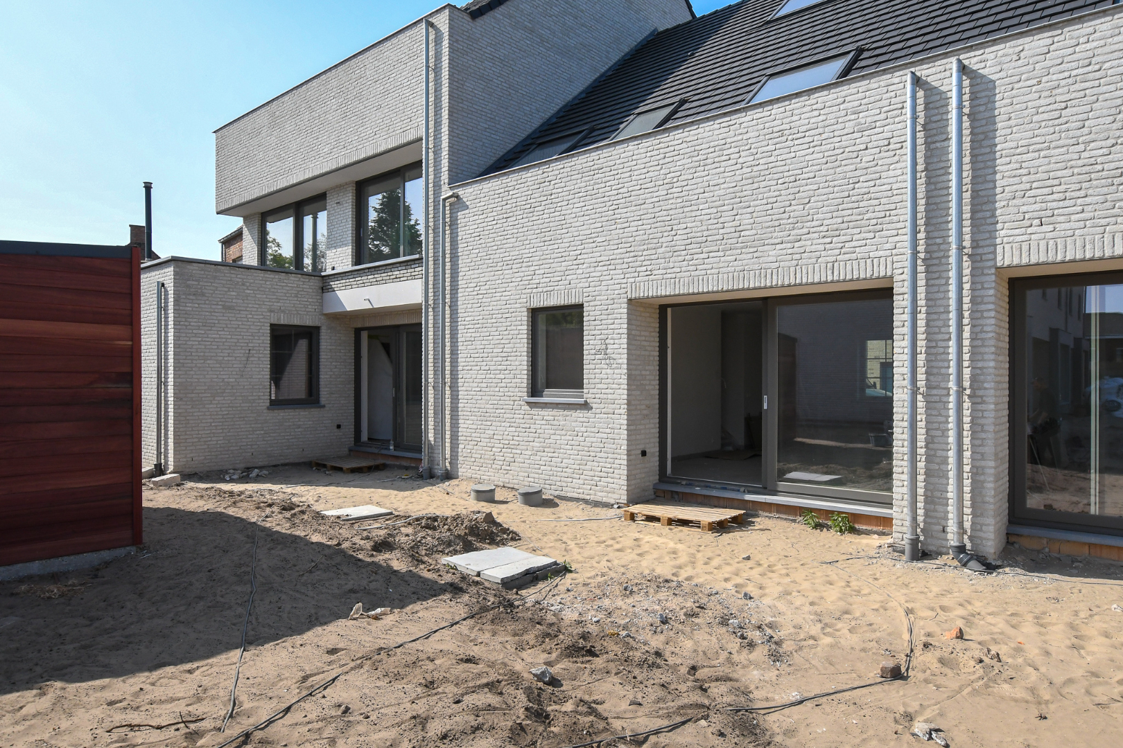 Prachtig aangelegd woonerf Marthe met nog 1 duplexappartement en woning te koop 