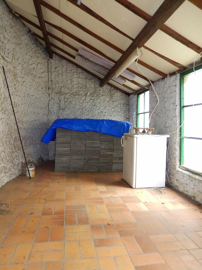 Op te frissen woning met tuin in hartje van Brugge! 