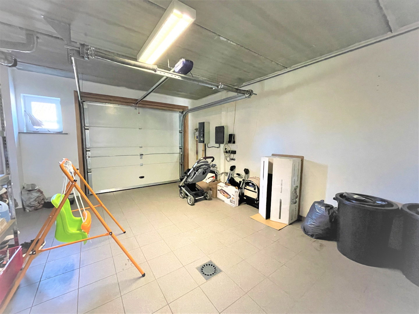 Recente woning met garage en aangename tuin 