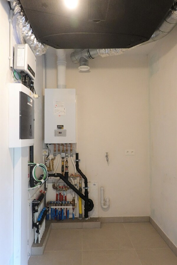 Nieuwbouwappartement met terras en tuin 