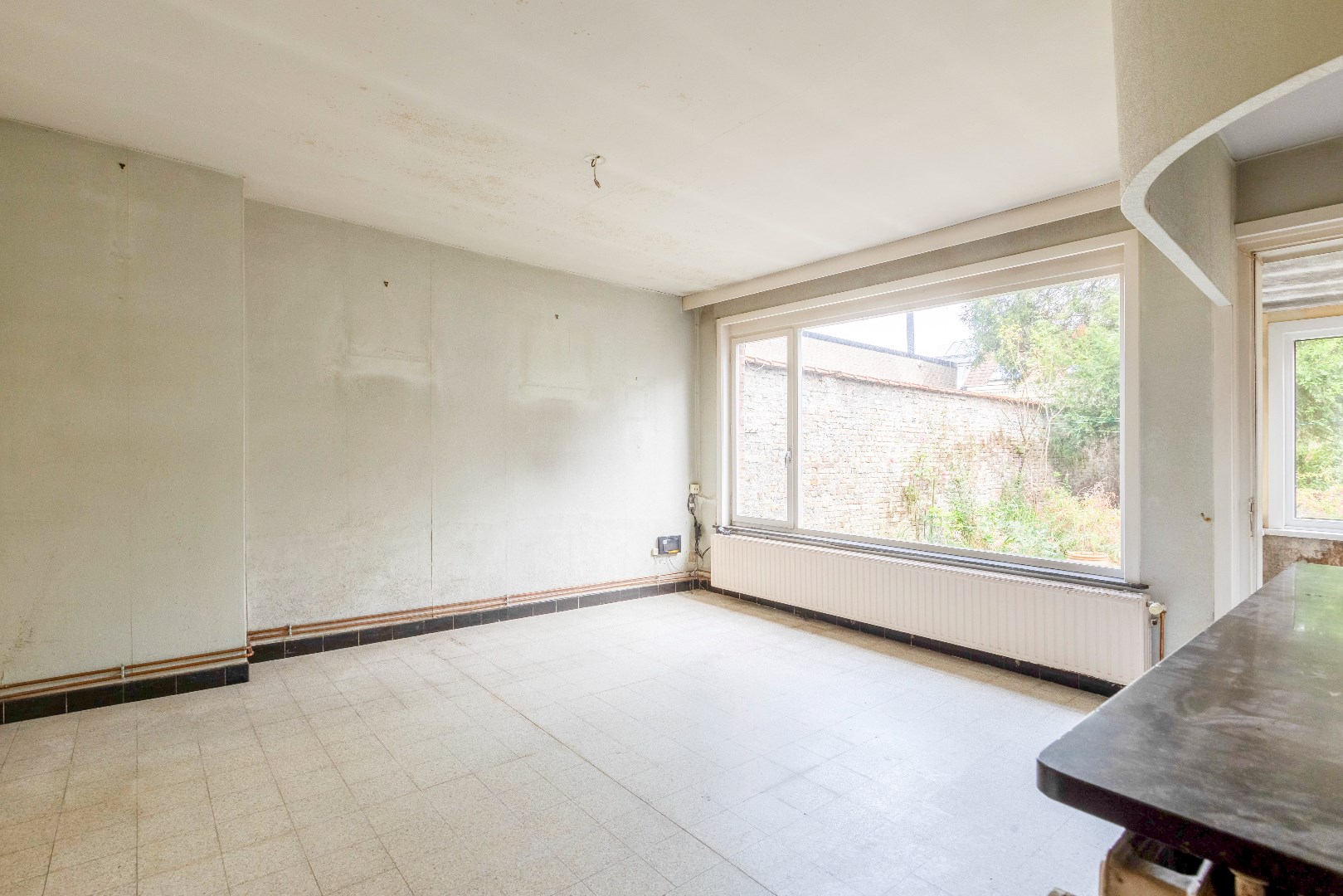 Te renoveren handelspand in het centrum van Ledeberg 