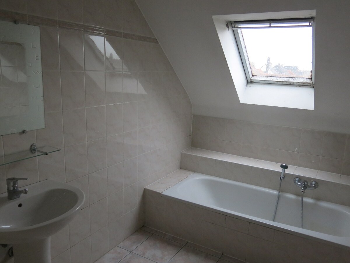 Appartement (100m²) met kleine terras 