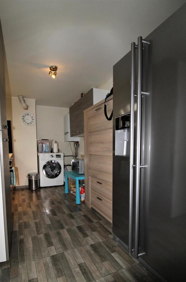 Welgelegen, comfortabel woonhuis met aangename tuin, nabij winkels 