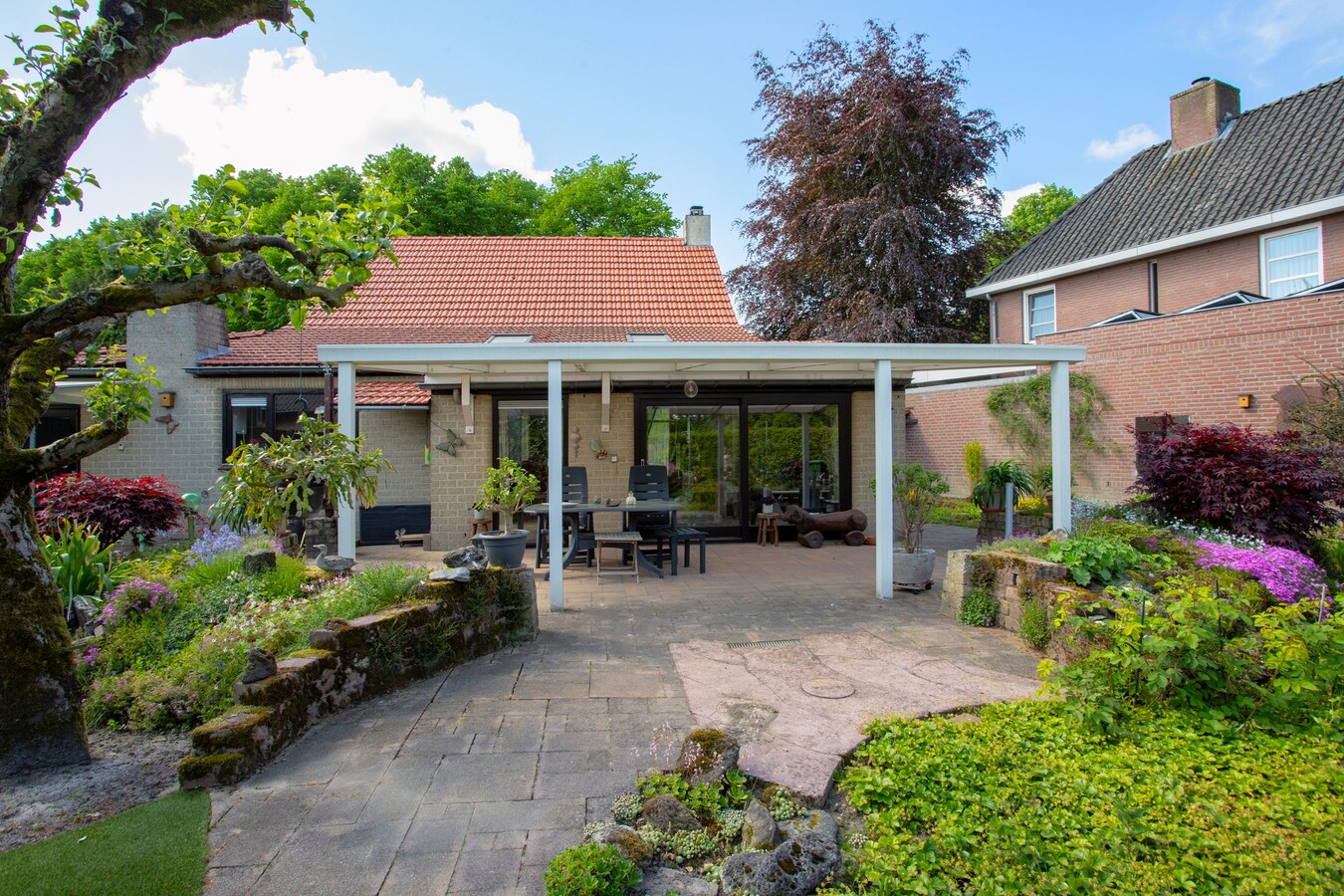 Vrijstaande woning met karakter, ruimte en een verrassende buitenruimte. 