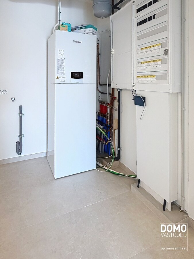 HOOGWAARDIG AFGEWERKT APPARTEMENT VAN 122,50 M² MET 2 SLAAPKAMERS, RUIM TERRAS EN PARKEERPLAATS TE CENTRUM TUILT 
