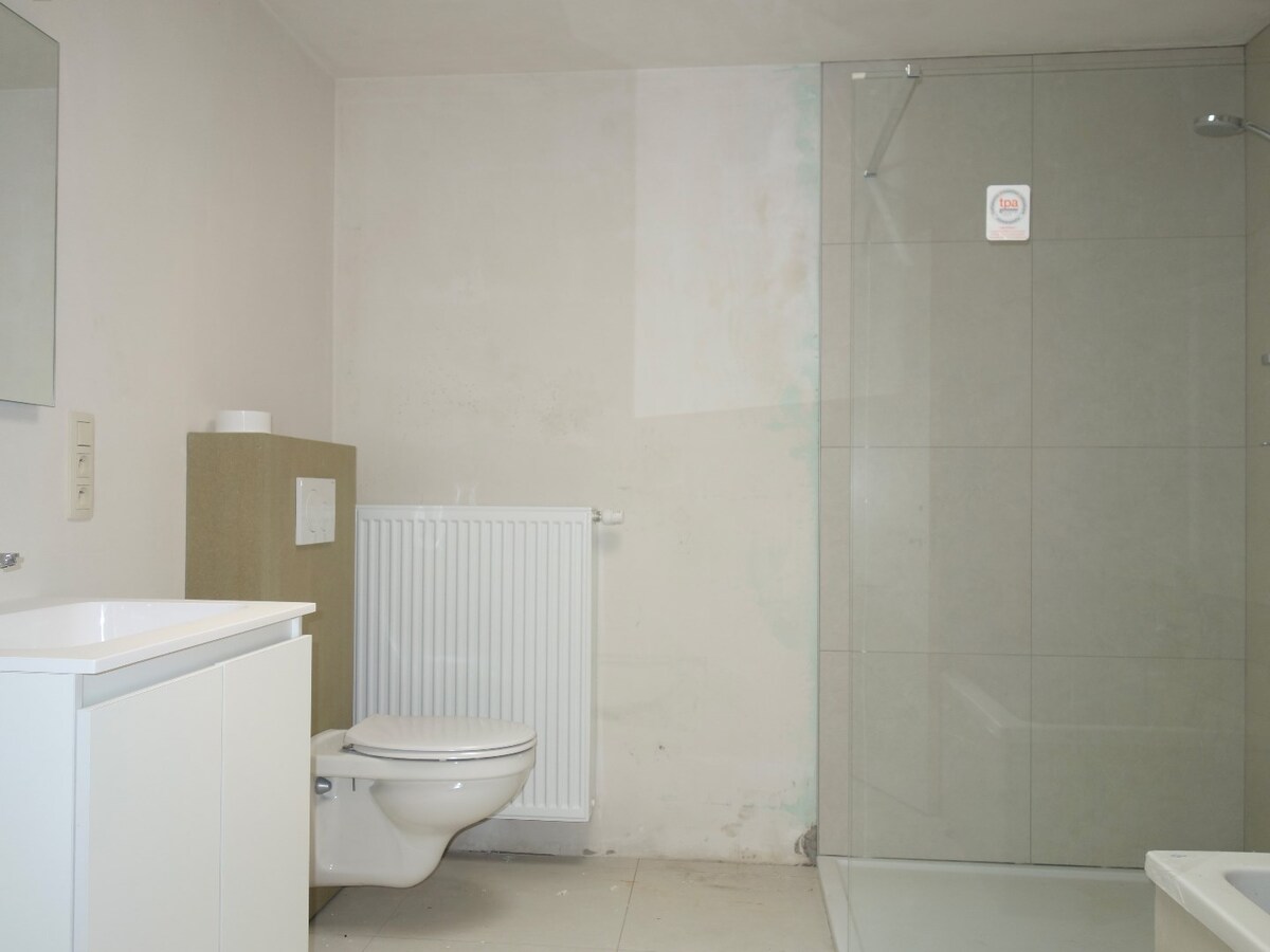 Construction moderne en plein coeur du village de Pecq ! 