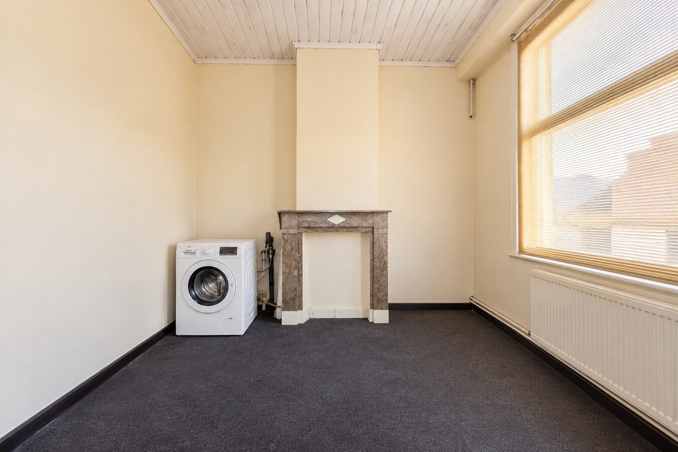 Te koop: Centraal gelegen stadwoning met 4 slaapkamers en diepe zuidgerichte tuin in Sint-Niklaas! 