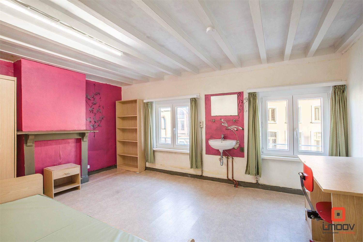 Mooie opbrengsteigendom met vijf lichtrijke studentenkamers 