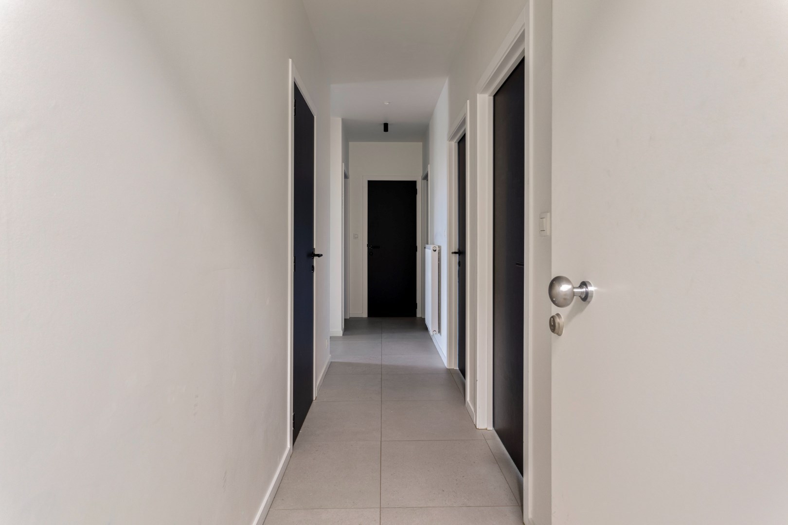 Lichtrijk nieuwbouwappartement met 3 slaapkamers, tuin, terras, kelderberging en 2 autostaanplaatsen - EPC 36 kWh/m² -bewoonbare opp. 115 m² 