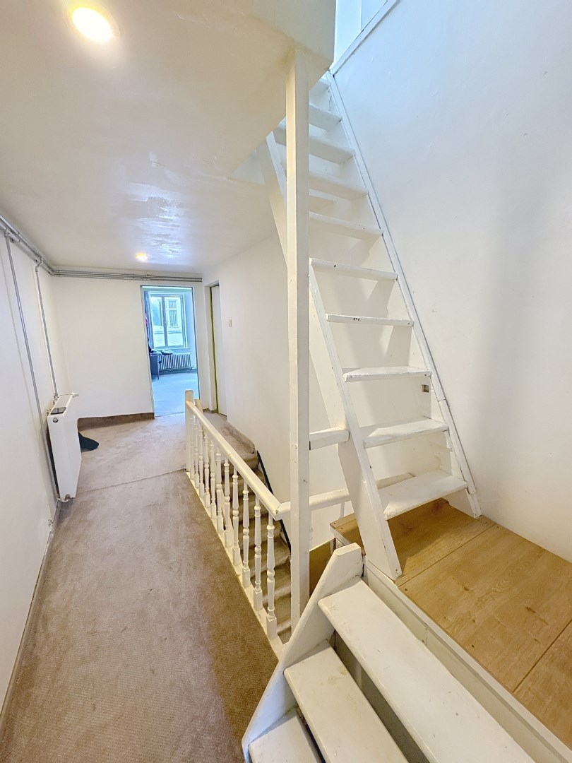 Ruime rijwoning met 4 slaapkamers in het historische Brugge 