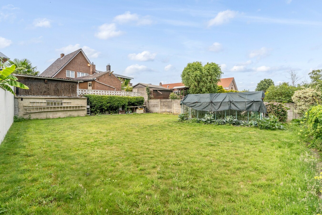 Halfvrijstaande gezinswoning op een ruim perceel van 13a80ca op wandelafstand van het centrum van Opoeteren! 