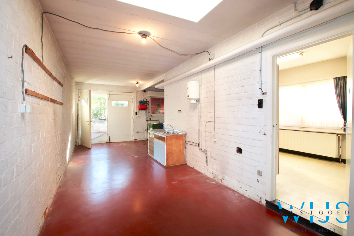 Te renoveren gezinswoning op een zonnig perceel van 1184m² te Wachtebeke ! 