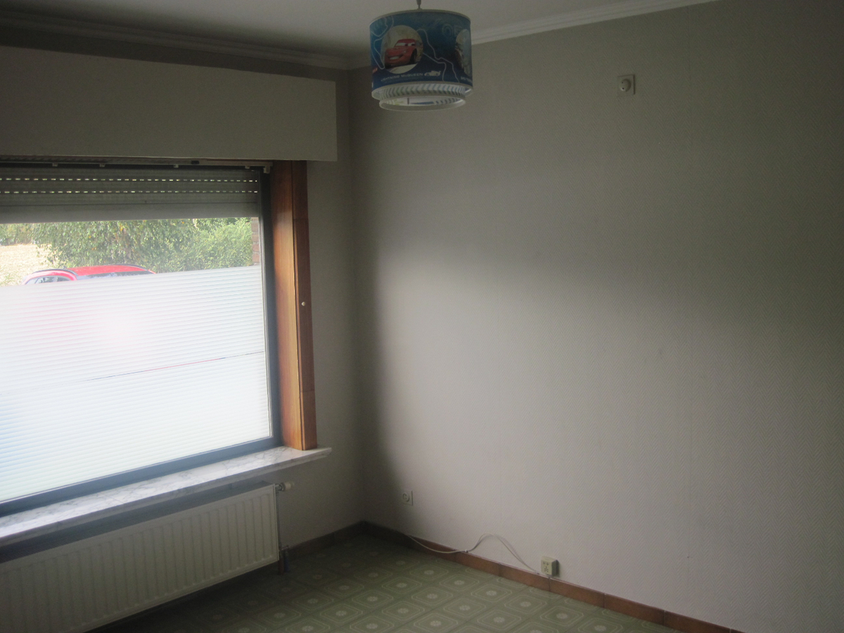 Degelijke gelijkvloerse woning. 