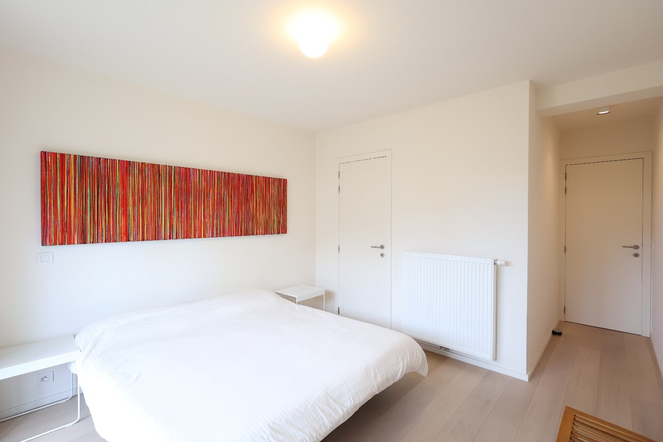 Modern 2slpk-appartement met privé tuin op wandelafstand van het strand 