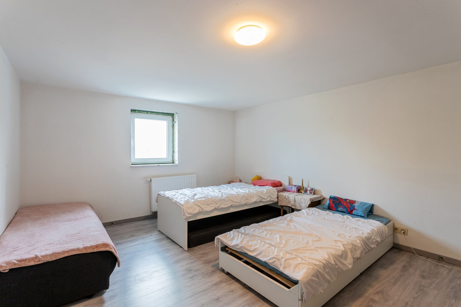 Ruime woning met 4 slaapkamers en binnenkoer in Petit-Enghien 