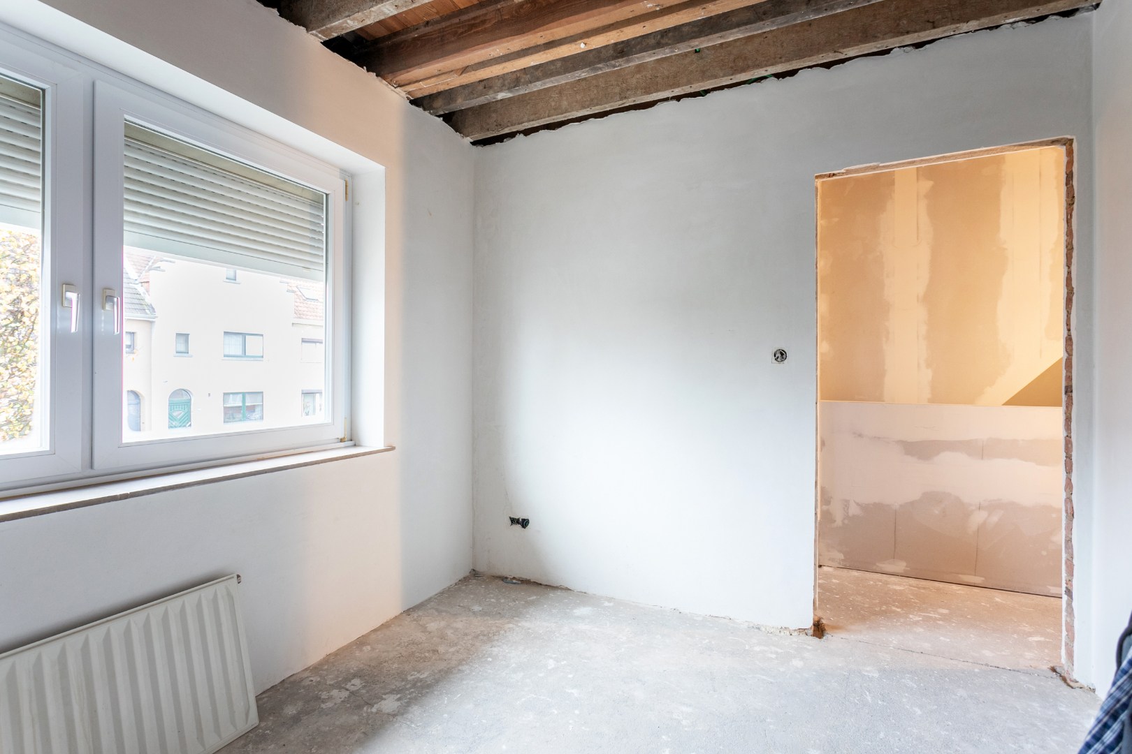 Rustig gelegen halfopen woning met 3 slpks en tuin te Buizingen 