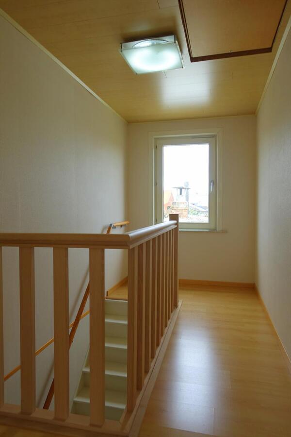 Centraal gelegen half-open woning 