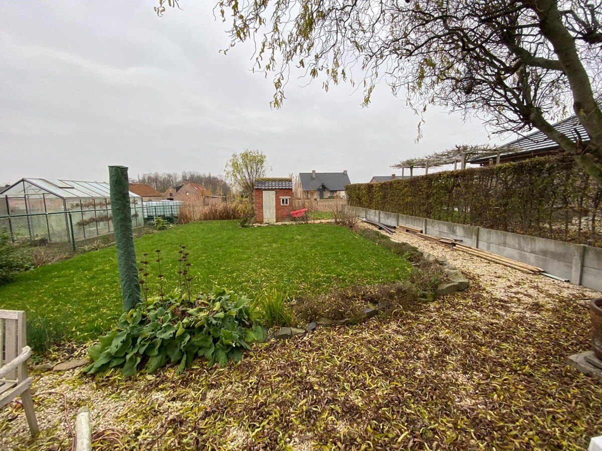 Rustig gelegen halfopen woning met zongerichte tuin 