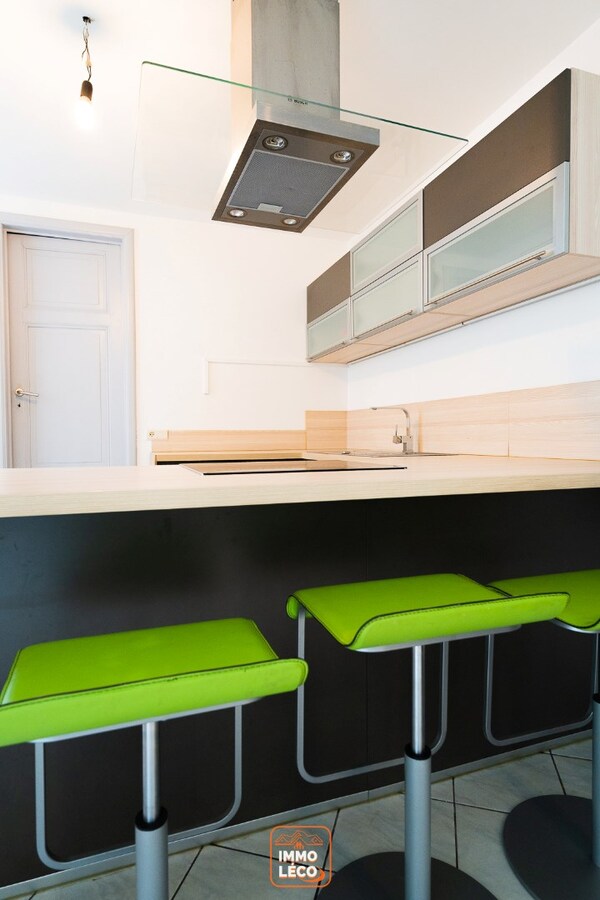 Grande maison de Ville en plein centre avec 4 chambres et jardin. 