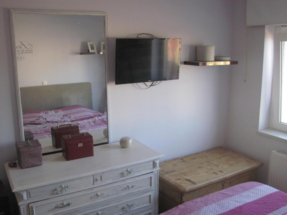 Ruim 2-slp-appartement met groot zonneterras én garage. Geen vaste kosten ! 