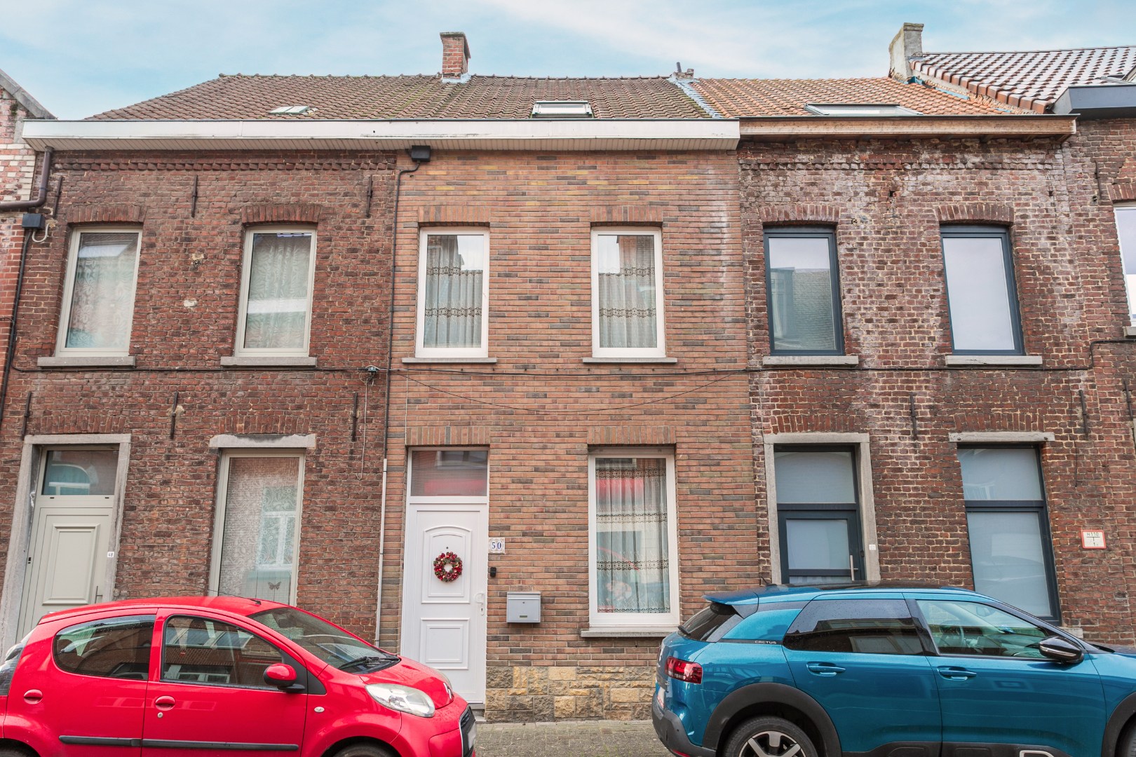 Instapklare woning met 3 slaapkamers, veranda en garagebox in Lembeek 