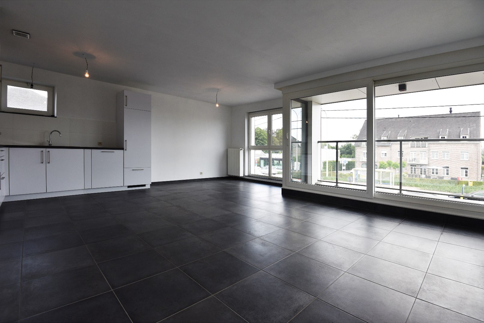 Centraal gelegen app met 1 slk, 2 terrassen en autostaanplaats te ADEGEM . 