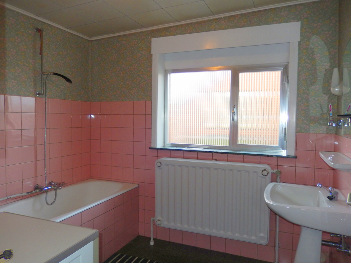 Alleenstaande woning met tuin en garage 