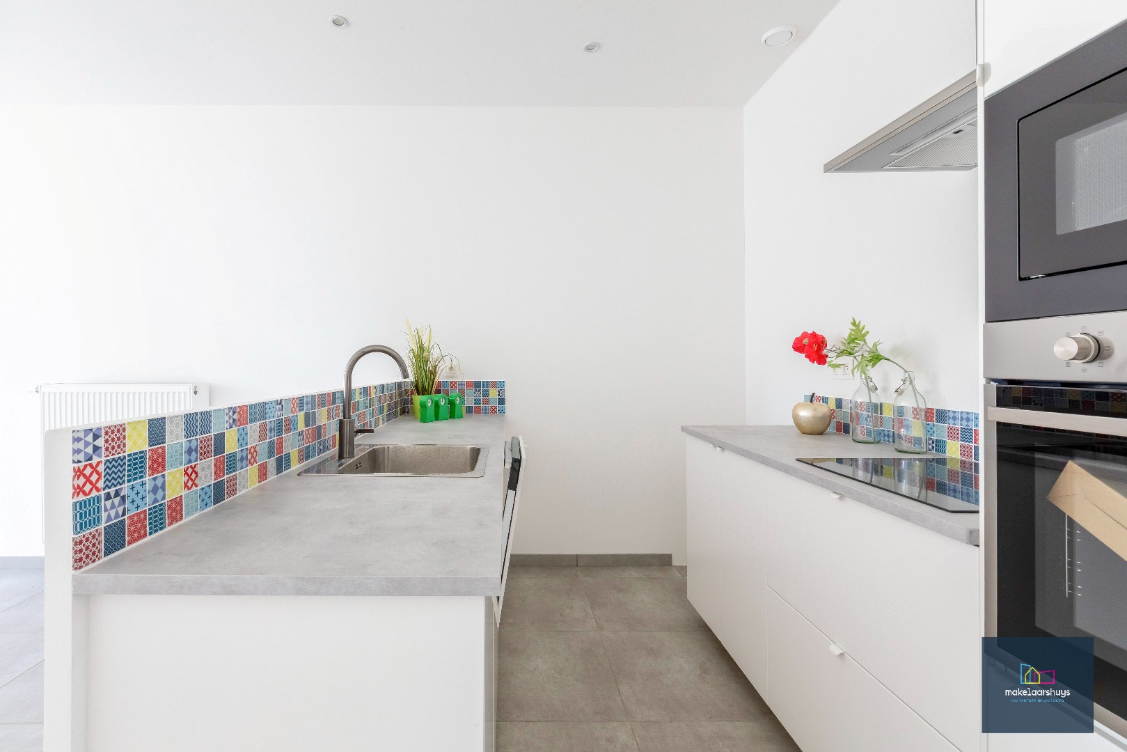 Instapklare energiezuinige woning met 3slpk tuin en staanplaats 