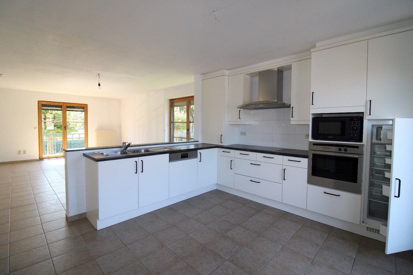 Ruim duplex appartement met mooi terras en garage 