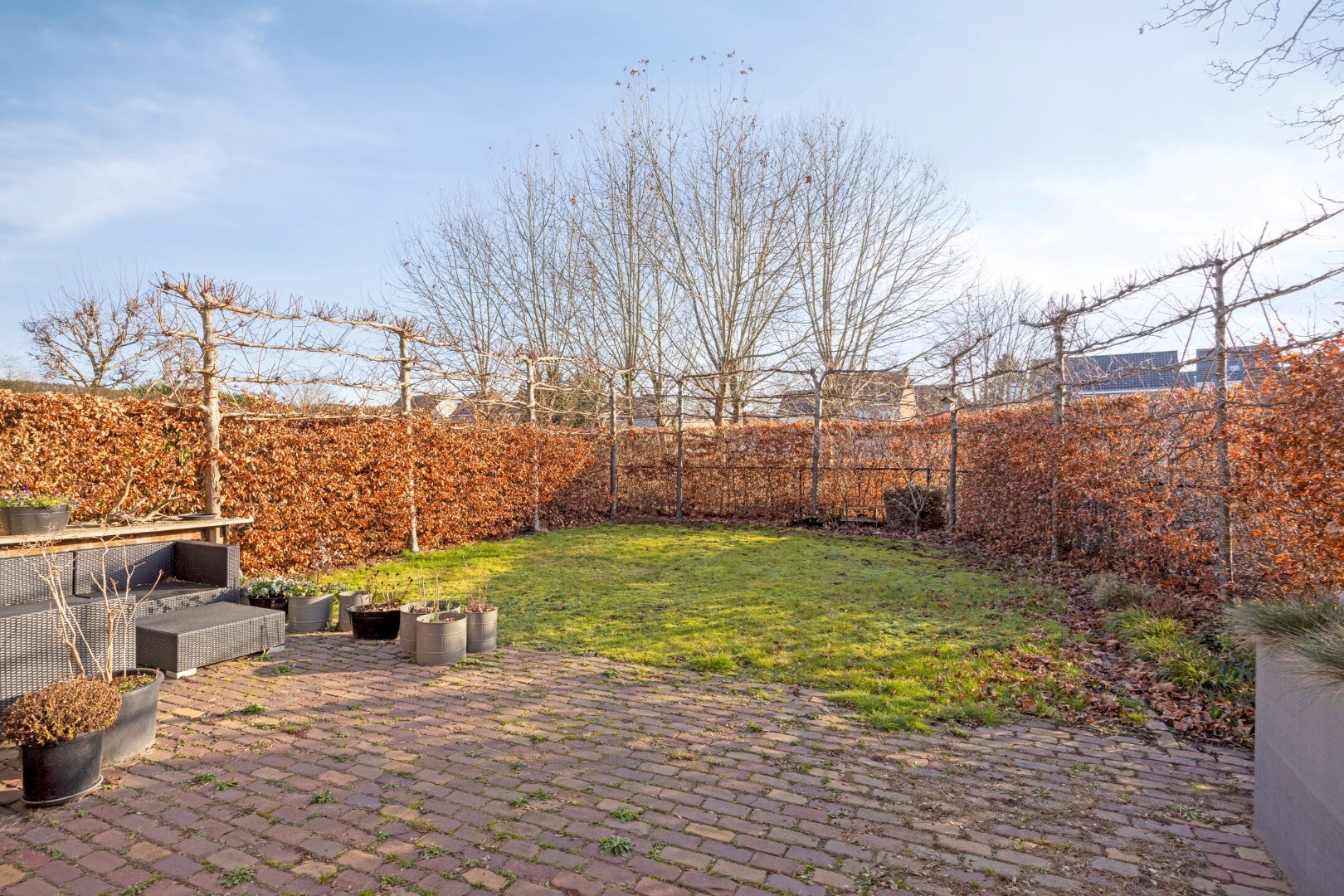 Luxueus gelijkvloers appartement met zuidgerichte tuin en garage in Tongerlo 