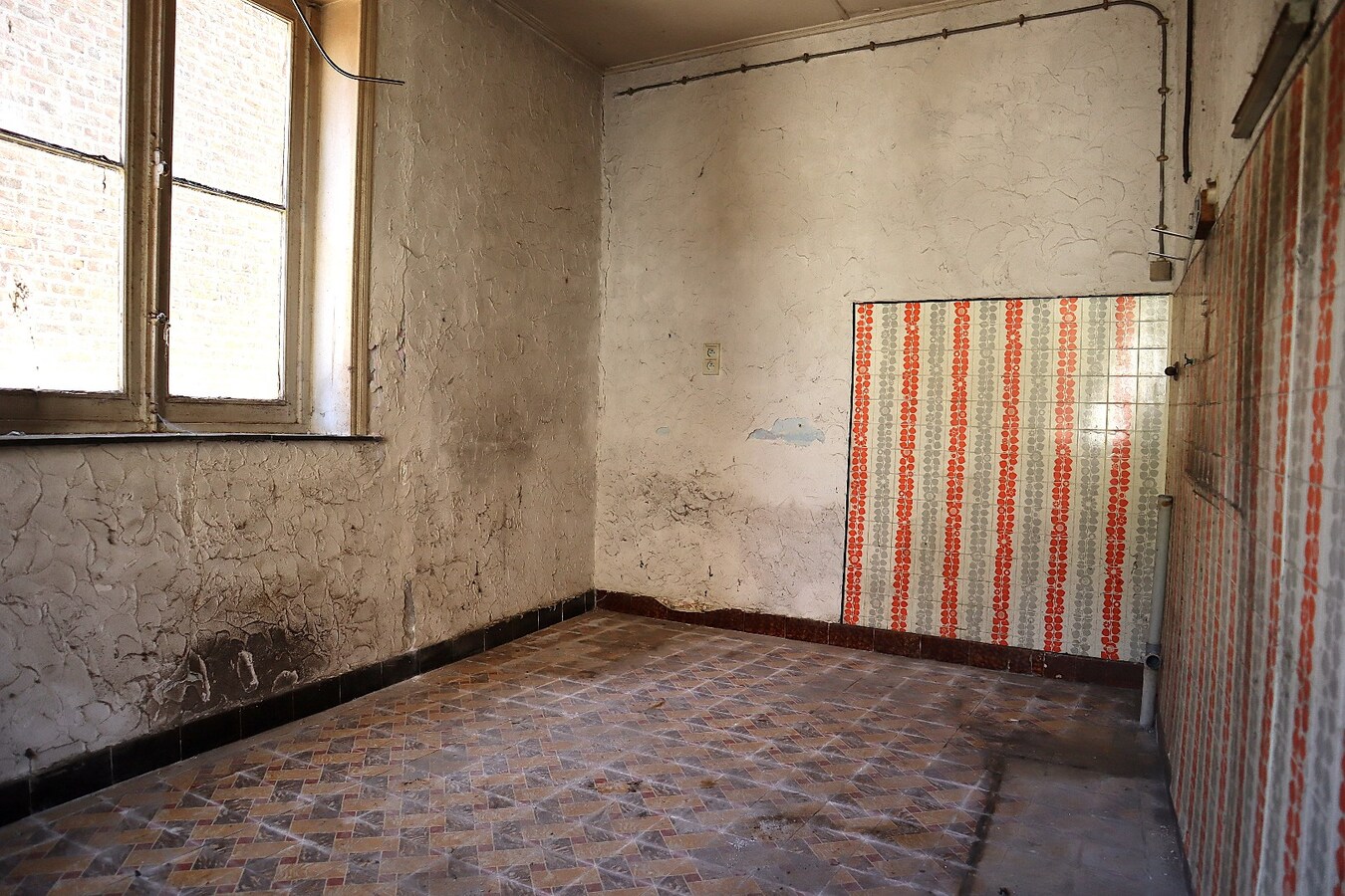 Te renoveren woning met magazijn/loods te Kessel-lo 