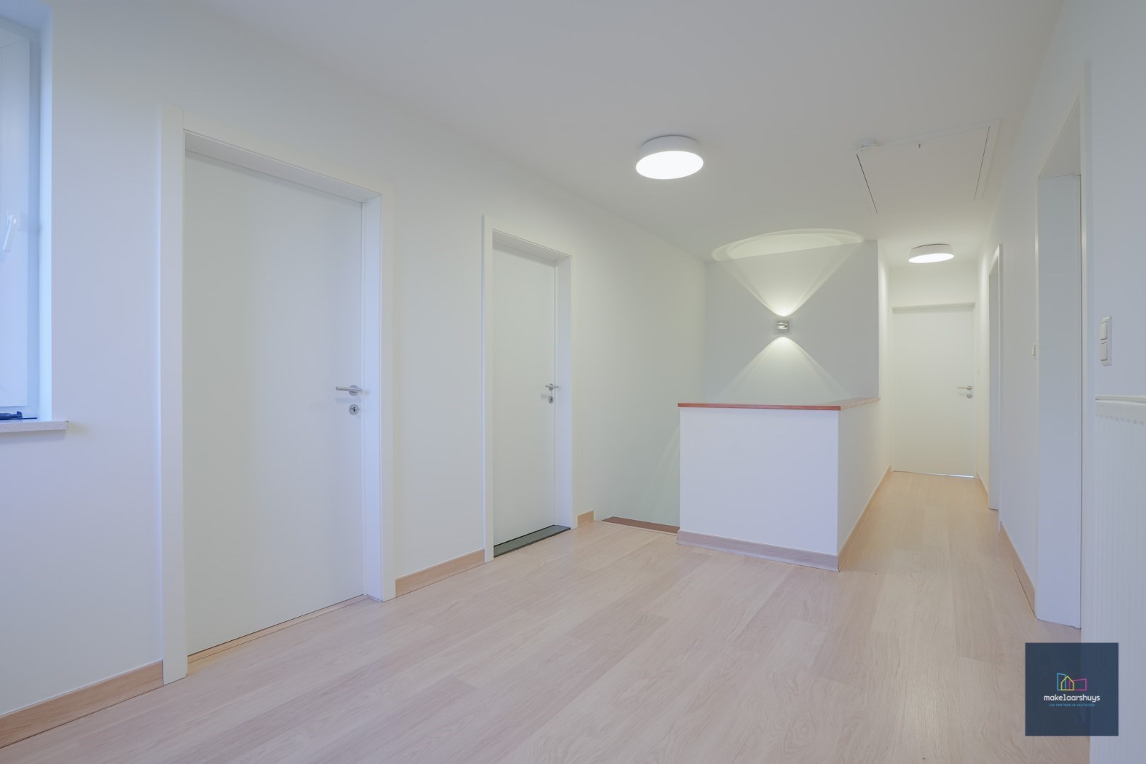 Ruime half-open bebouwing te Heusden met garage en tuin 