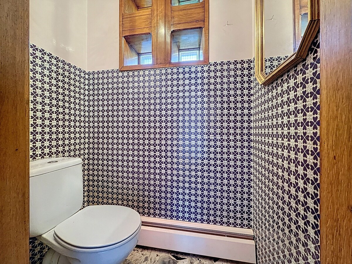 Statige laagbouwvilla met groene achteruit te Scheldewindeke 