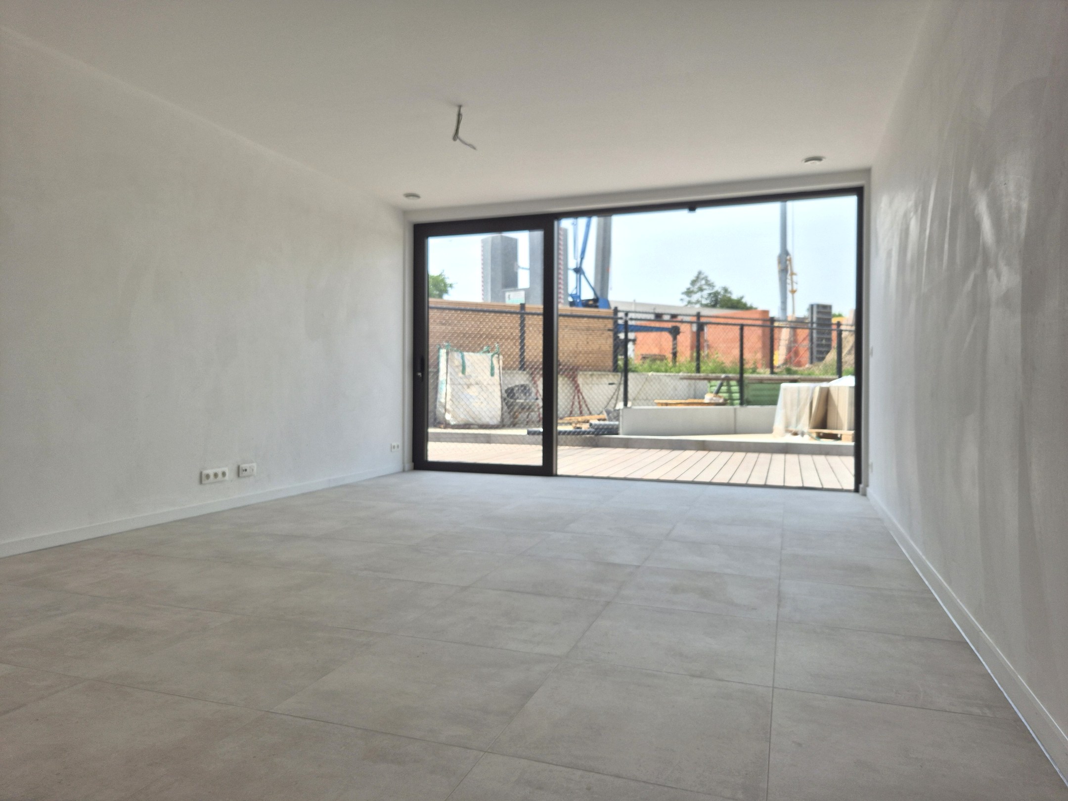 Gelijkvloers appartement met 2 slaapkamers, tuin en terras 