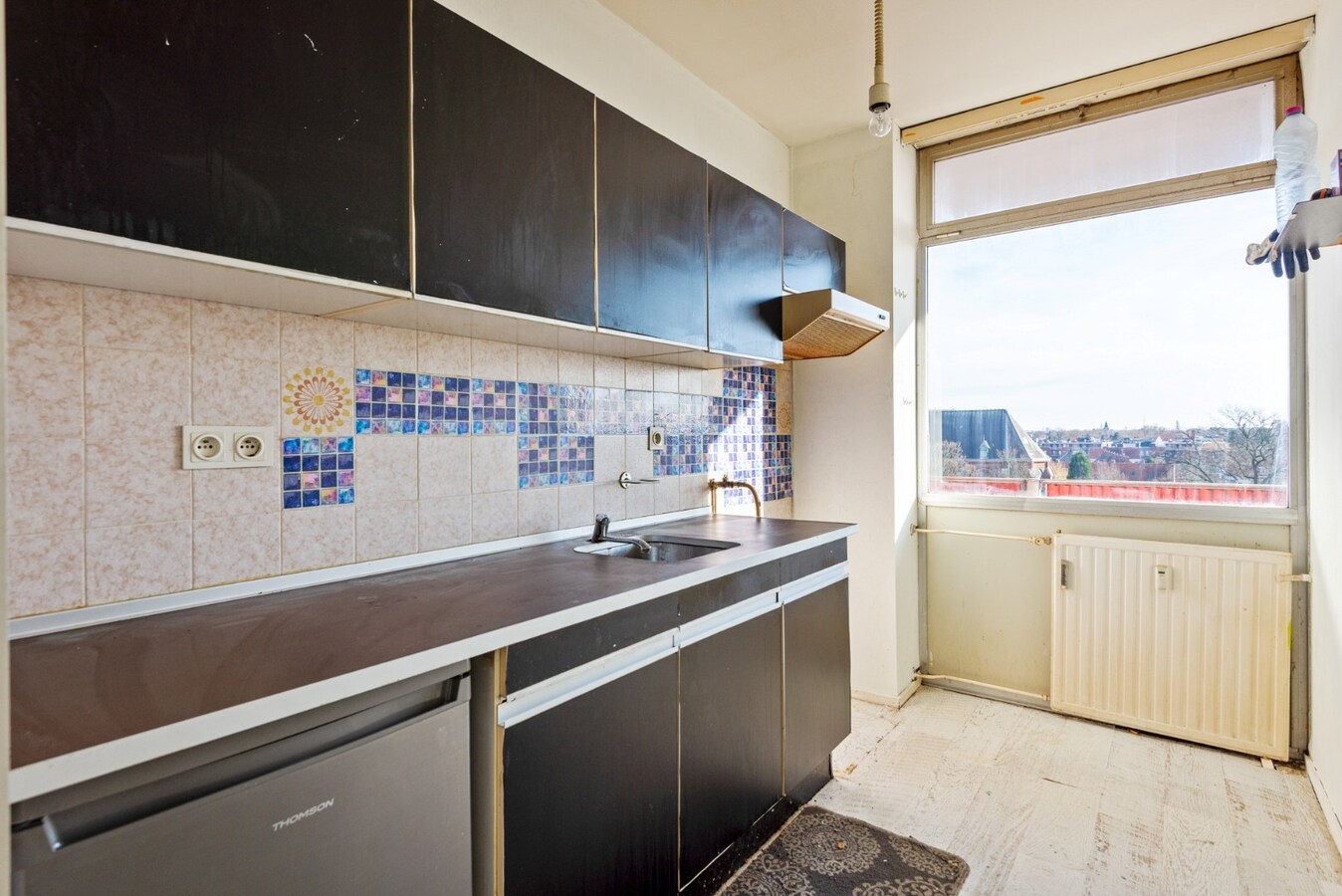 Te renoveren appt. met 2 slpk en terras te hartje Hoboken! 