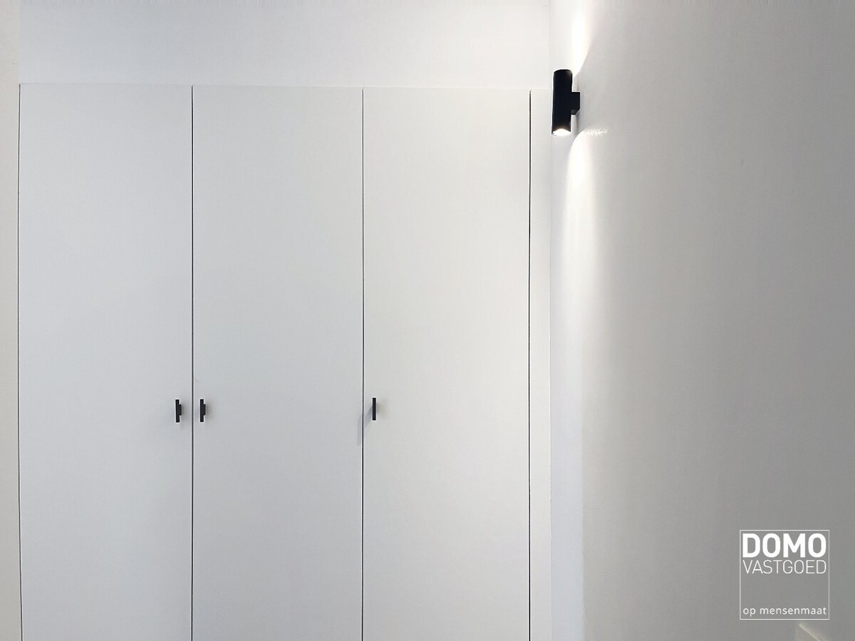 Instapklare totaalrenovatie met luxueuze afwerking, 4 slaapkamers en zuidgerichte tuin 