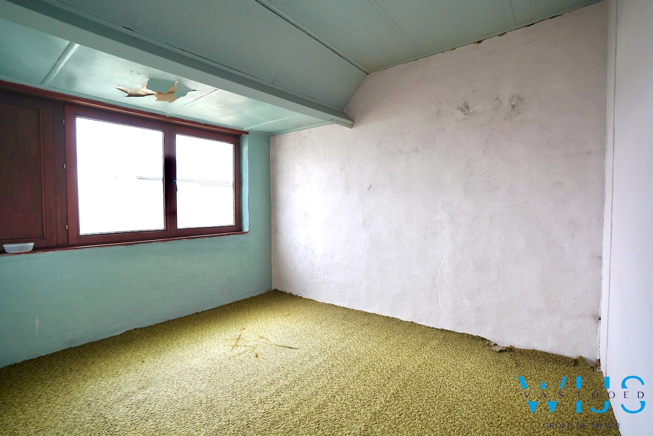 Te renoveren woning in centrum Ertvelde 