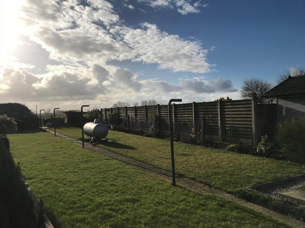 Degelijke halfopen woning met zongerichte tuin 