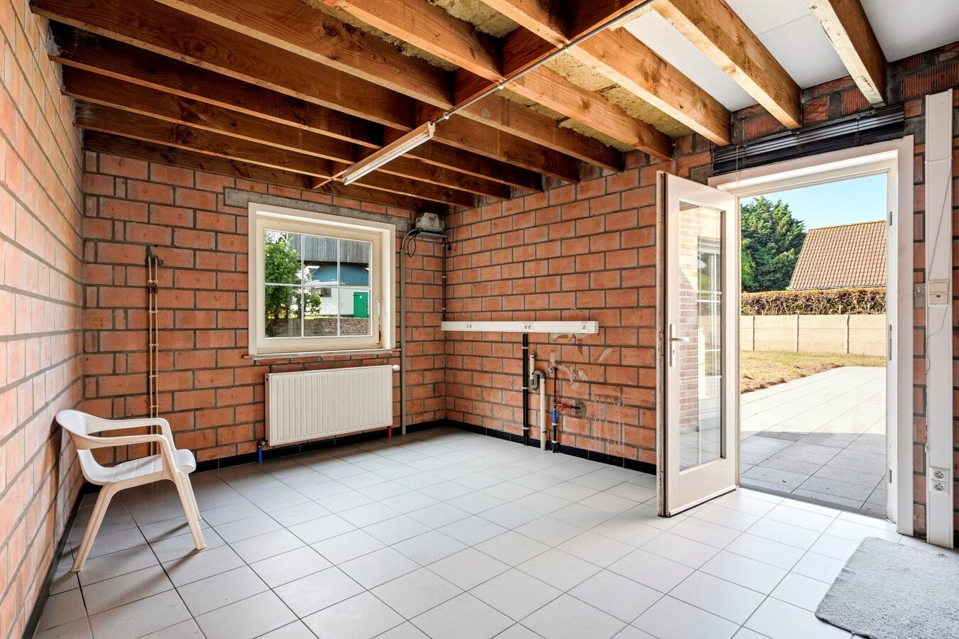 Ruime halfopen woning met 5 slaapkamers te koop in Werken met garage en ruime tuin! 