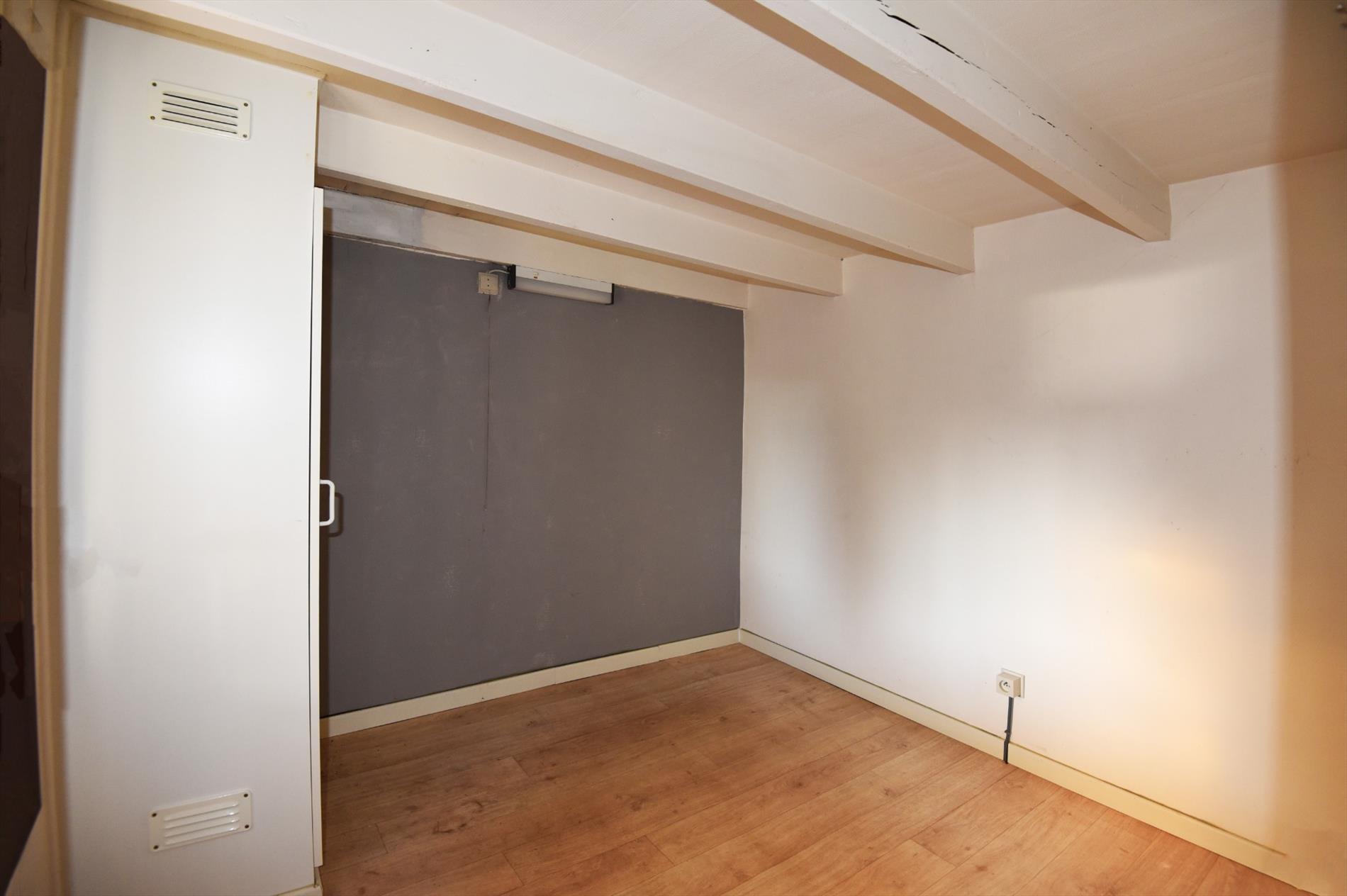 Half open bebouwing met 2 slaapkamers, tuin en garage te Maldegem. 