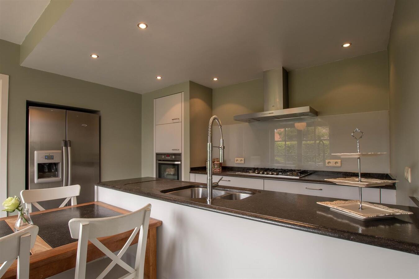 Knappe halfopen gezinswoning te Heulebrug - Heist 