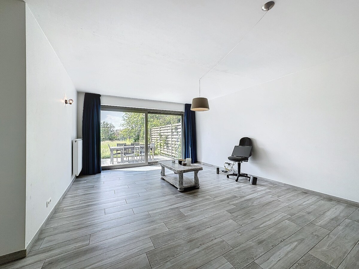 Recent (2017) gelijkvloers appartement met grote tuin te Ophasselt 