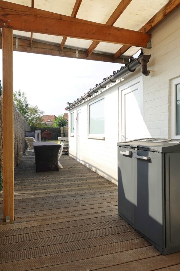 Gerenoveerde rijwoning met 3 slaapkamers en tuin 