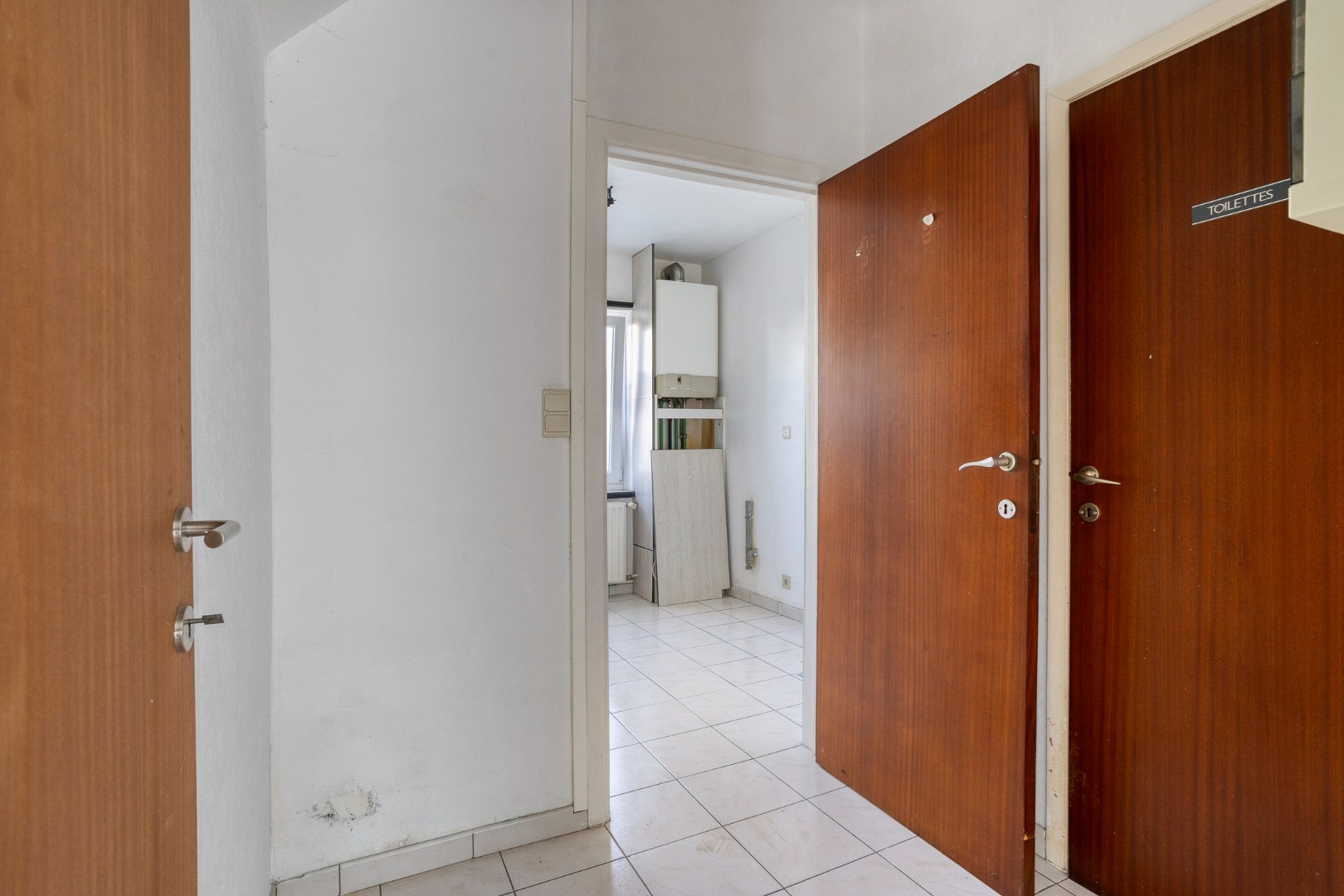 TE RENOVEREN WONING met 2 woonéénheden en tuin – 1640 SINT-GENESIUS-RODE 
