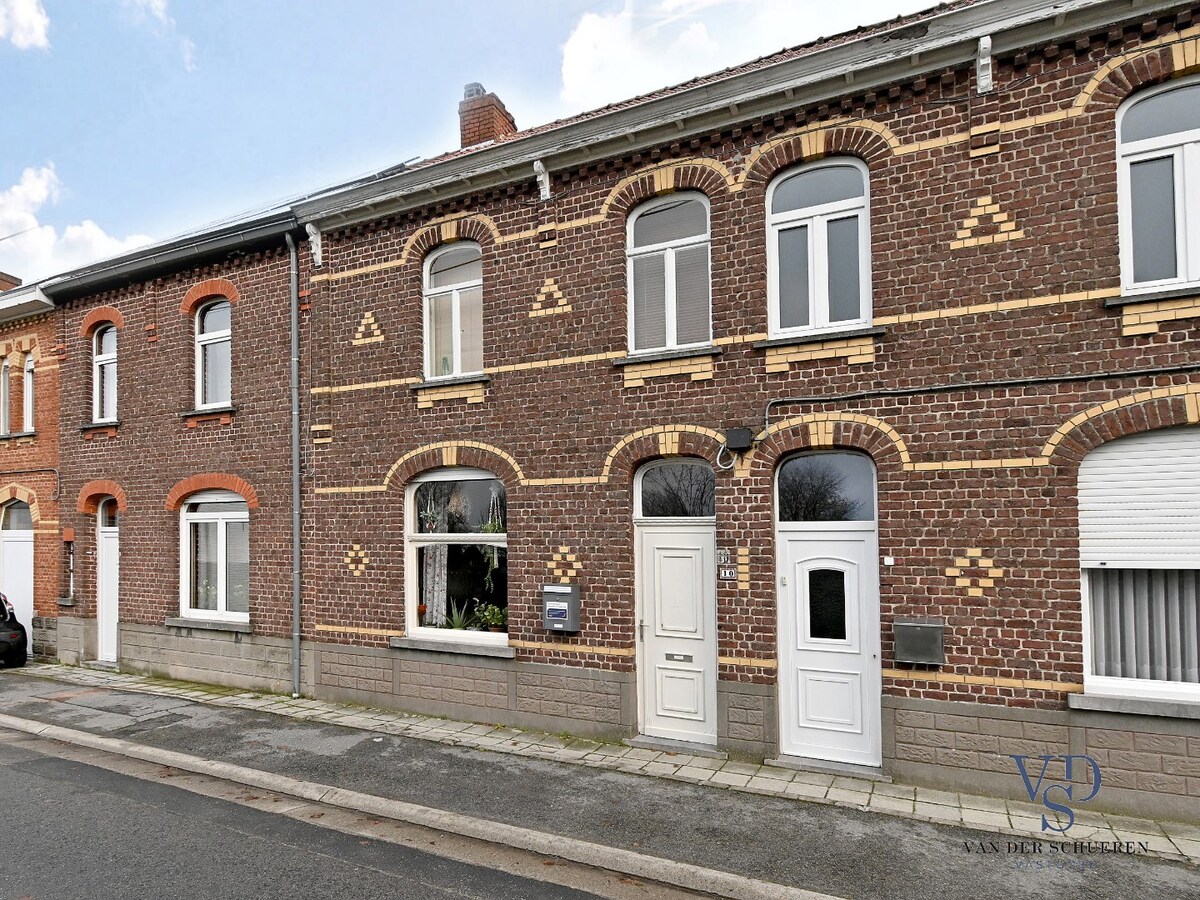 Gezellige rijwoning met tuin. 