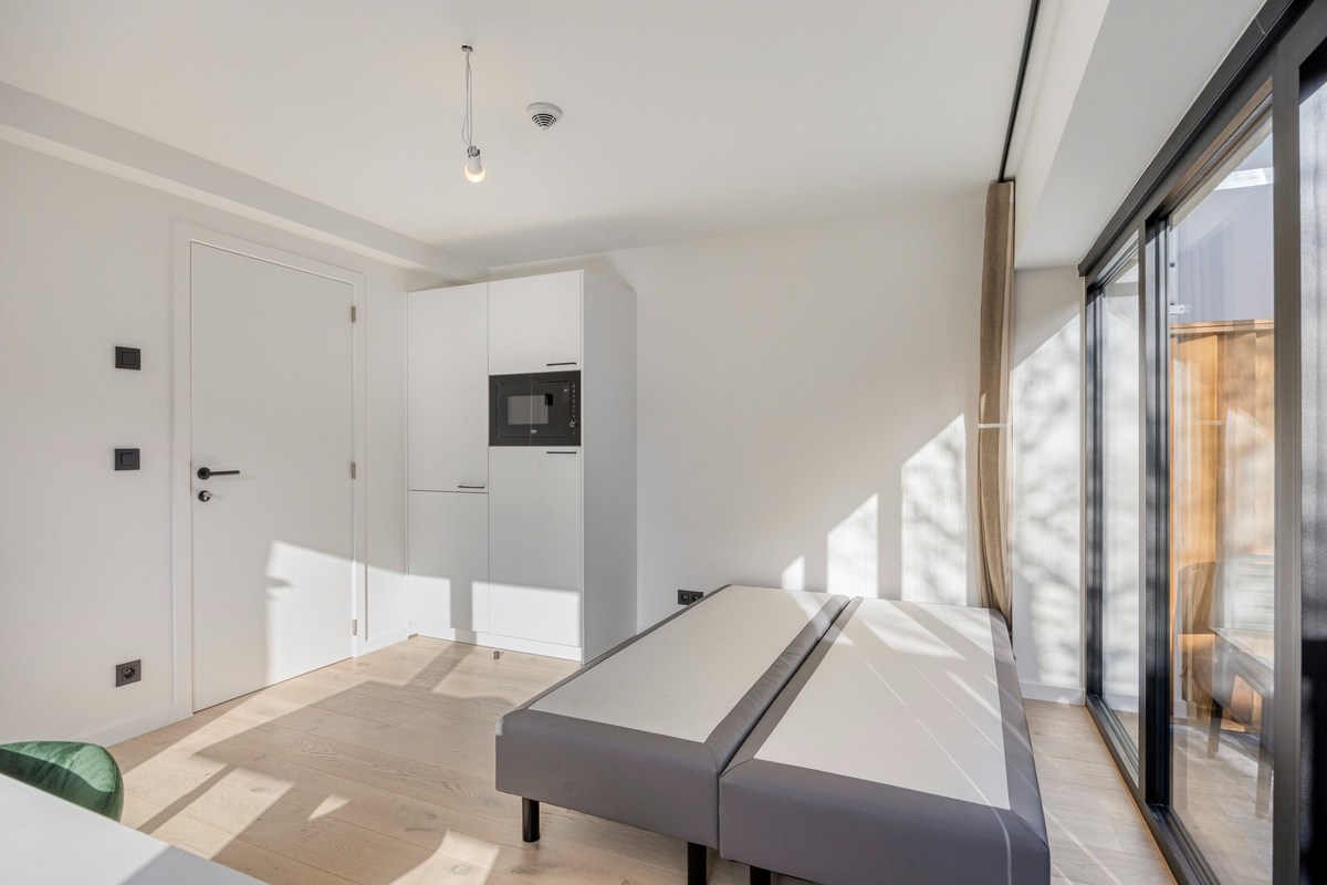 Volledig gerenoveerd en gemeubelde studentenkamer met privé badkamer en tuin - EPC A! 